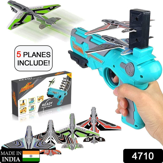 Children happily playing outdoors, launching a foam airplane with the toy gun.