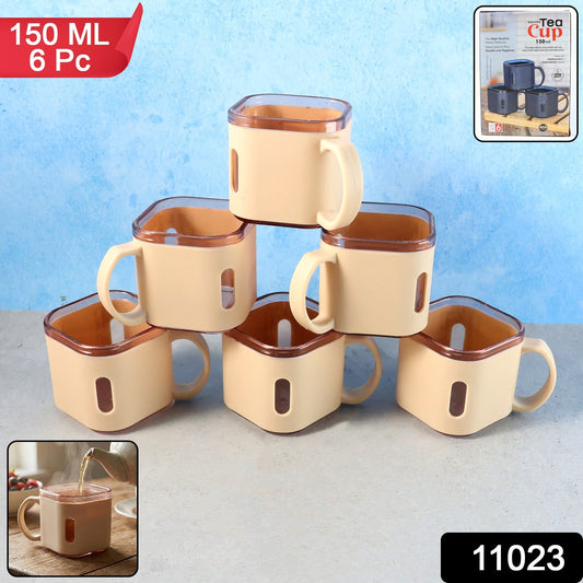 Six square tea cups arranged neatly on a table